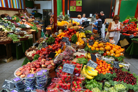 LONDON, UK - JULY 8, 2016: People shop at Borough Market in Southwark, London. It is one of oldest markets in Europe. Its 1,000th birthday was in 2014.のeditorial素材