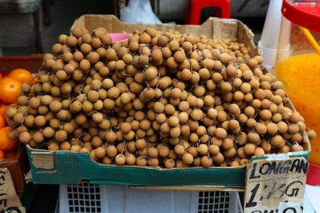 Longan fruit (also known as dragon's eye) in local food market in Kuala Lumpur city, Malaysia.
