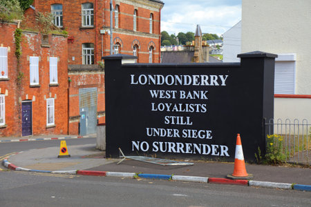 DERRY, UK - JUNE 24, 2024: Londonderry West Bank Loyalists Under Siege No Surrender loyalist mural in Derry (aka Londonderry) in Northern Ireland.のeditorial素材