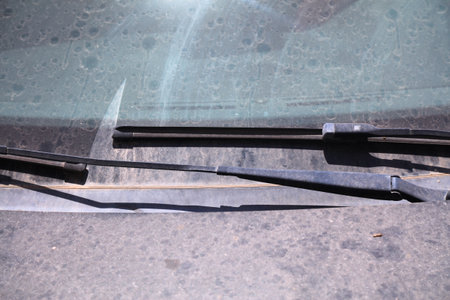 Dirty car needs a wash. Compact car with dirt on windshield.の写真素材