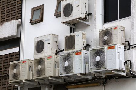 KUCHING, MALAYSIA - MARCH 8, 2024: Hitachi, National and Acson brand air conditioners wall mounted...