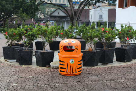 KUCHING, MALAYSIA - MARCH 8, 2024: Cat public garbage can in Kuching, capital city of Sarawak state in Malaysia. Kuching is known as the city of cats.のeditorial素材
