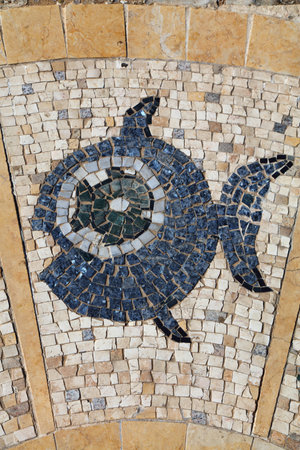 TEL AVIV, ISRAEL - NOVEMBER 2, 2022: Pisces zodiac sign mosaic near the Wishing Bridge in Jaffa Old Town in Tel Aviv, Israel. The public space zodiac mosaic was made by sculptor Ruth Zarfati.のeditorial素材