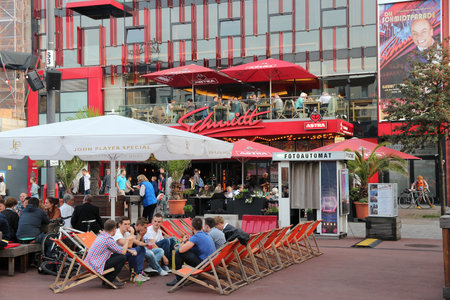 HAMBURG, GERMANY - AUGUST 28, 2014: People visit entertainment district at Reeperbahn in St. Pauli,...