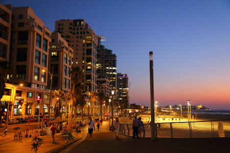 TEL AVIV, ISRAEL - NOVEMBER 3, 2022: People visit beachfront promenade (Tayelet) in Tel Aviv, Israel. Tel Aviv is the economic and technological center of Israel.のeditorial素材