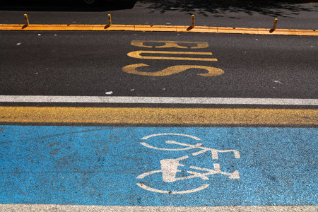 Messina city in Italy. Bicycle lane road marking next to separate bus lane.の写真素材