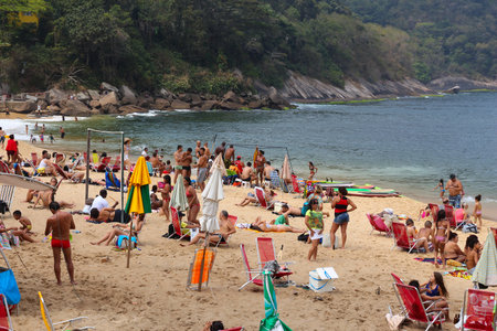 RIO DE JANEIRO, BRAZIL - OCTOBER 19, 2014: People visit Vermelha beach in Rio de Janeiro. In 2013 1.6 million international tourists visited Rio.のeditorial素材