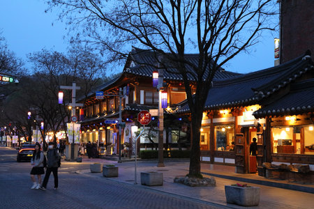 JEONJU, SOUTH KOREA - APRIL 3, 2023: Evening street view of Jeonju Hanok Village, traditional wooden architecture district in the city of Jeonju.のeditorial素材