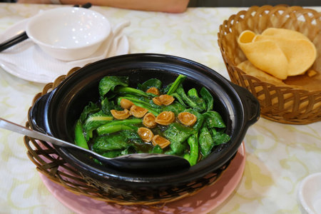 Food in Malacca, Malaysia. Nyonya cuisine - stir-fried choy sum in oyster sauce.の写真素材