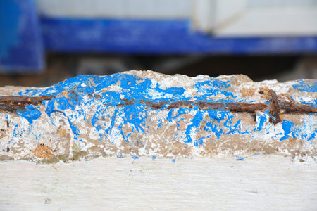 Weather damage of concrete. Flaking concrete and exposed rusty rebar steel. Problem of Brazil.