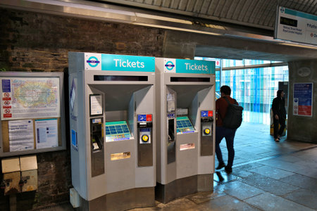 LONDON, UK - JULY 9, 2024: Ticket machines at Docklands Light Railway (DLR) Shadwell train station...