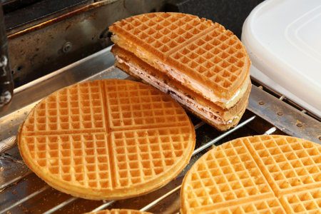 Korean street food at BIFF Square in Busan, South Korea. Apple jam cream waffles.の写真素材