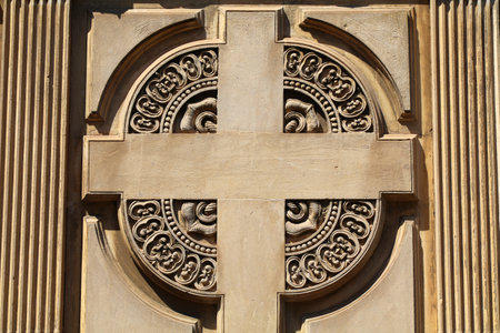 Cross ornament stonework at Cimitero Monumentale (Monumental Cemetery) of Catania city in Sicily island, Italy.の写真素材