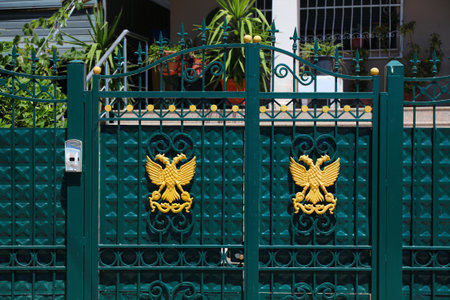 Albanian eagle national symbol decoration on a gate in Durres, Albania.