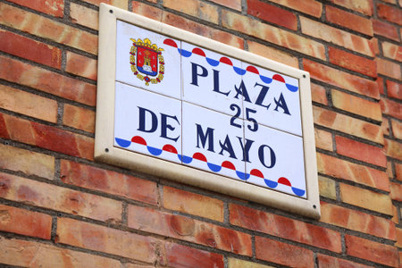 Alicante city in Valencian Community in Spain. Plaza De 25 Mayo square name sign.の写真素材