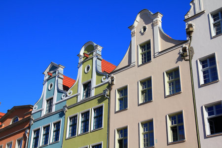 Poland - Gdansk city in Pomerania region. Colorful apartment buildings next to Dlugi Targ square.