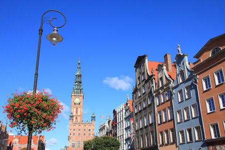 Poland - Gdansk city in Pomerania region. Colorful apartment buildings and the Main Town Hall next...