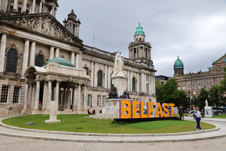 BELFAST, UK - JUNE 22, 2024: People visit the City Hall in Belfast, Northern Ireland.のeditorial素材