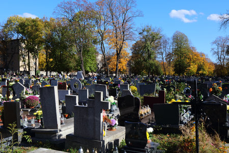 BYTOM, POLAND - NOVEMBER 2, 2023: The graves at a cemetery after All Saints Day (Wszystkich Swietych) in Poland.のeditorial素材