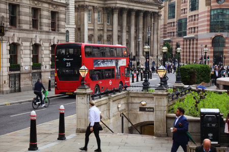 LONDON, UK - JULY 9, 2024: Traffic on Bank Junction in the City of London, UK.のeditorial素材