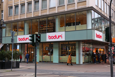 FRANKFURT, GERMANY - DECEMBER 6, 2016: People shop at Bodum specialty coffee maker, coffee pot and...