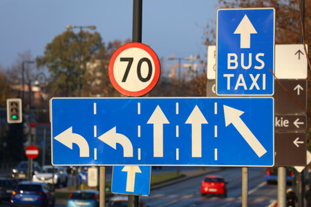 Complicated 5 lane city intersection. Lane directions traffic sign in Krakow, Poland.の写真素材