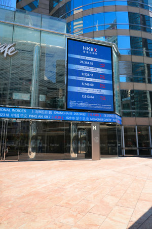 HONG KONG, CHINA - NOVEMBER 17, 2025: Hong Kong Stock Exchange HKEX stock prices ticker scrolling...
