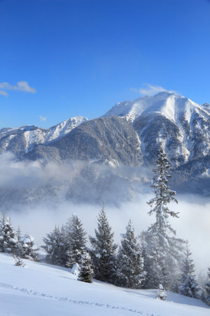 Bad Hofgastein, Austria. Ski resort winter view in Europe. Sunny day in High Tauern (Hohe Tauern) mountain range in Alps.の写真素材