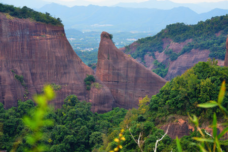 Rock formations in Danxia Mountains (Danxiashan) in Renhua County in Shaoguan (Guangdong Province) in China. Seal shaped rock. AAAAA rated tourist attraction.の写真素材