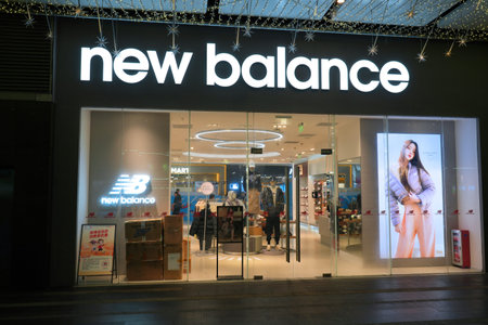 GUANGZHOU, CHINA - NOVEMBER 7, 2025: New Balance brand shoe store in Beijing Road shopping area, a...
