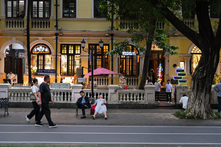 GUANGZHOU, CHINA - NOVEMBER 7, 2025: People visit historic Shamian island district in Guangzhou city in Guangdong region of China.のeditorial素材