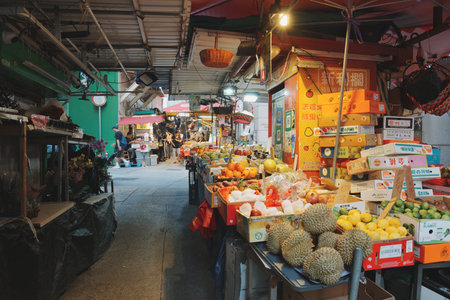 HONG KONG, CHINA - NOVEMBER 17, 2025: People visit Graham Street Market in Mid-Levels of Hong Kong, China.のeditorial素材