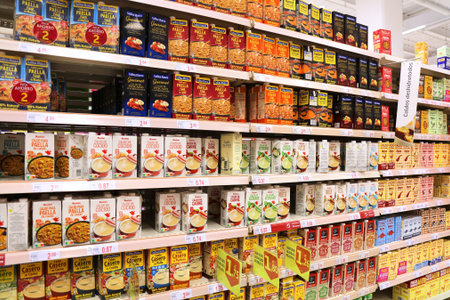 MADRID, SPAIN - APRIL 13, 2025: Ready broth in carton packagings in a grocery store in Madrid,...