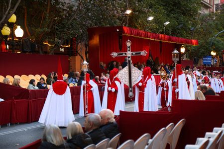 ALICANTE, SPAIN - APRIL 16, 2025: Semana Santa (Holy Week) procession, local religious celebration event in Alicante, Spain.のeditorial素材