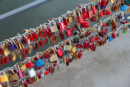 LUBECK, GERMANY - AUGUST 29, 2014: Love locks locked by couples on a footbridge in Lubeck, Germany.のeditorial素材