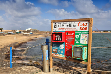 FUERTEVENTURA, SPAIN - DECEMBER 6, 2024: Beach lifesaving equipment and public AED defibrillator at...