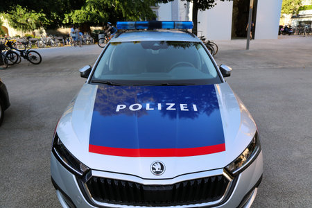 SALZBURG, AUSTRIA - AUGUST 4, 2022: Austrian Police Skoda Octavia car parked in Salzburg, Austria.のeditorial素材