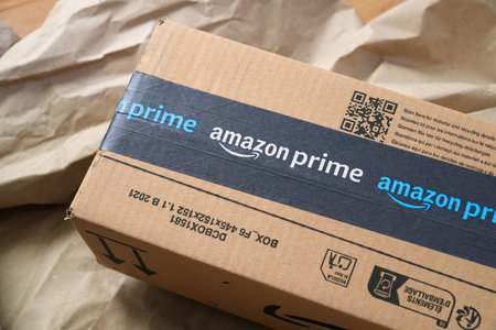 WARSAW, POLAND - MARCH 3, 2026: Amazon Prime online shopping order delivered package cardboard box in Europe.のeditorial素材