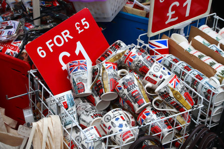 LONDON, UK - JULY 13, 2019: Souvenir mugs from London at a gift store. London is the most populous city in the UK.