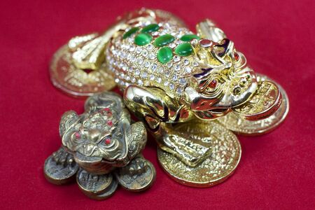 New and old feng shui bronze frogs. の写真素材