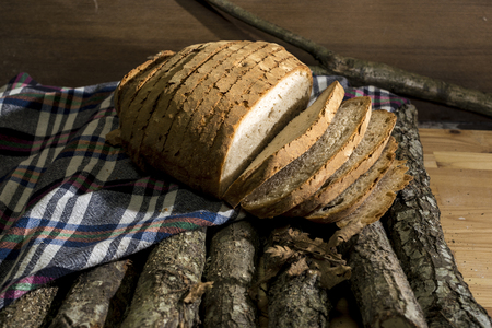 Sliced bread on woodの写真素材