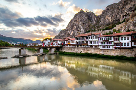 Old town of Mostar at sunset, Bosnia and Herzegovina. Old Ottoman houses night and mirrored view by the river. The town is the capital of the region.の写真素材
