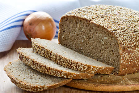 Sliced bread on a wooden stand