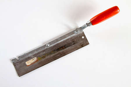 Hand saw for wood work on white backgroundの写真素材