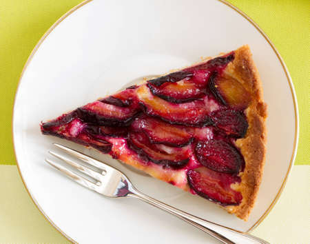 Delicious plum cake with organic plum, top view