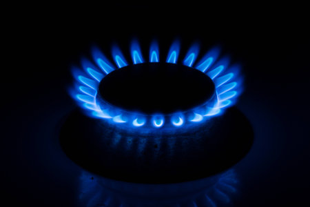 Close up of a gas burner on black backgroundの写真素材