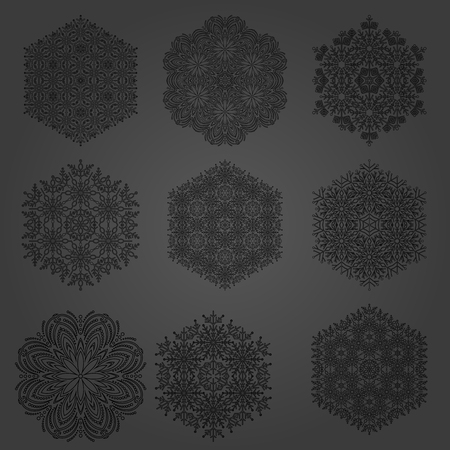 Set of vector black snowflakes. Fine winter ornaments. Snowflakes collection. Snowflakes for backgrounds and designsのイラスト素材