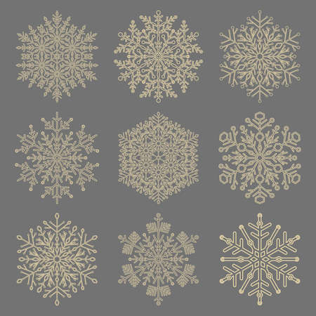 Set of vector snowflakes. Golden winter ornaments. Snowflakes collection. Snowflakes for backgrounds and designsのイラスト素材