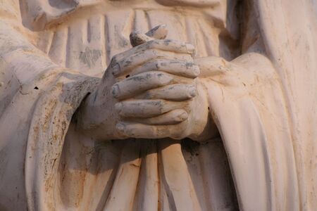 Folded handsの写真素材