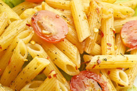 pasta with pasta sauce and tomatoの写真素材